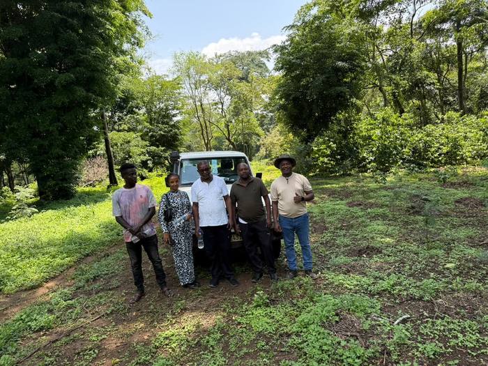 The Moyica team with farm workers at the plantation in Kaffa